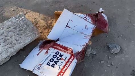 Dying for a bag of flour: Videos and eyewitness accounts cast doubt o.